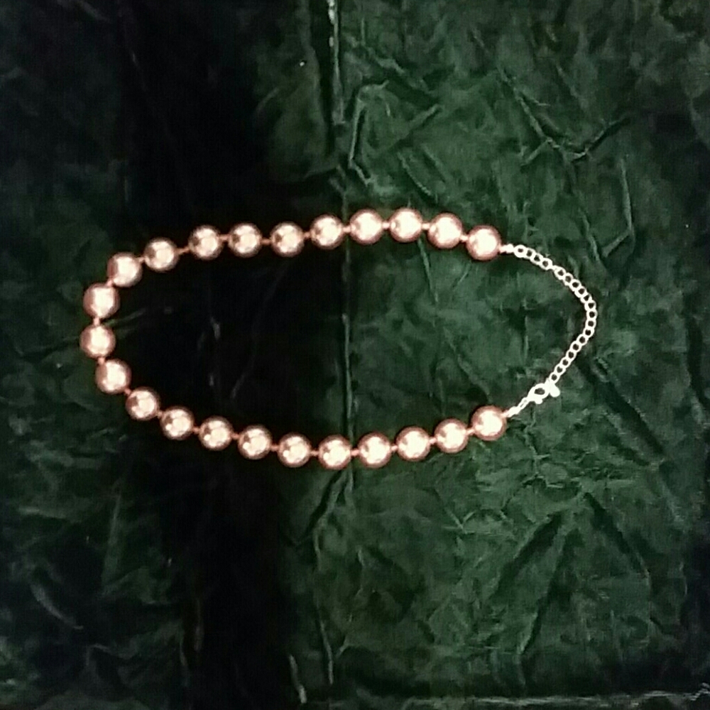 Reflective gold toned necklace